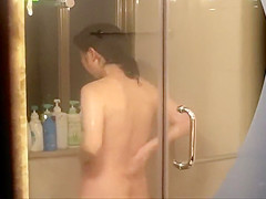 Peeping on her shower through a window